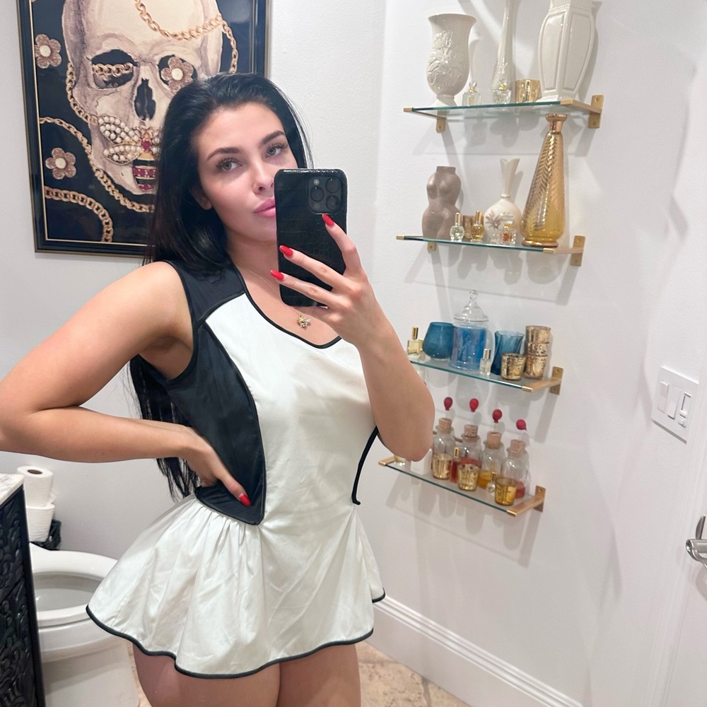Black and white peplum type style top